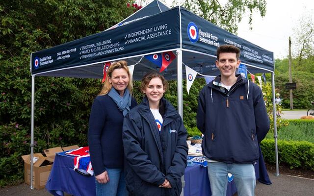 Josh Rowles at tent selling medals