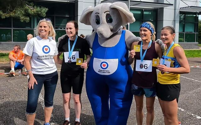 Julie Corbett and others with Ben Elephant mascot