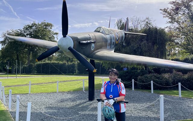Trish at HQ Air Cmd High Wycombe in front of Spitfire