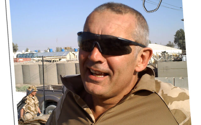 Gary Thompson in uniform and sunglasses