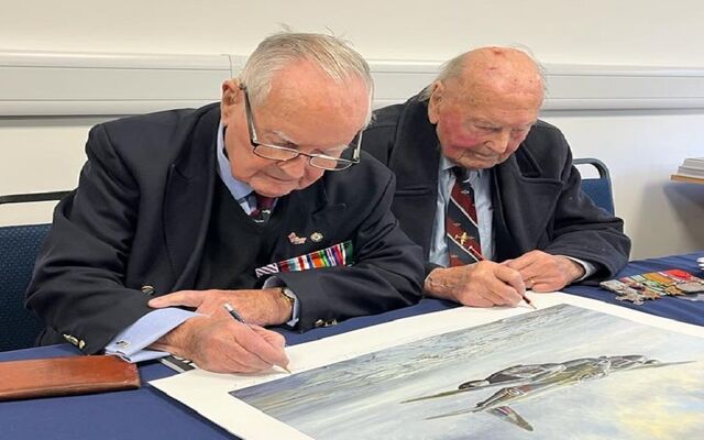 Colin and George signing aircraft print