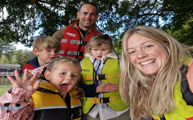 Family photo wearing life jackets on an activity day out