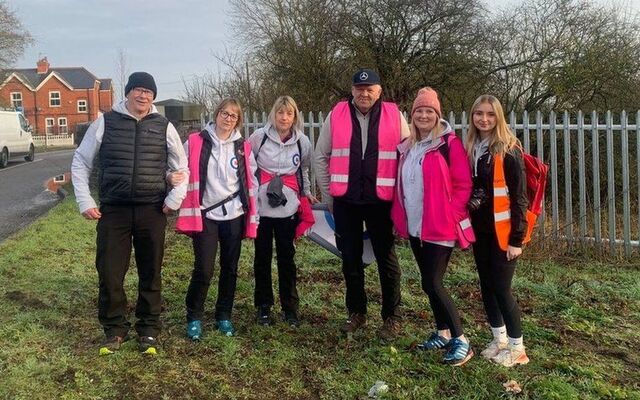 Carrianne's family and friends gathered in hi-vis