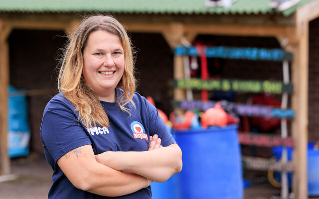 Julia Purton smiling arms crossed