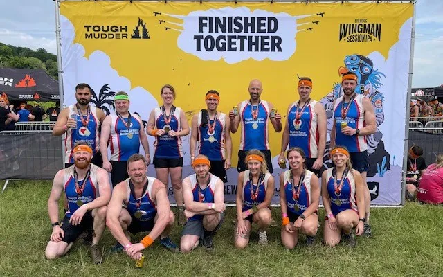 RAF Halton team posing with medals at finish