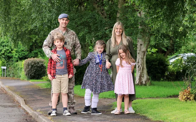 Ritchie family standing on street