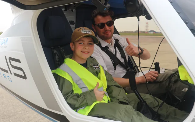 Jacob in plane giving thumbs up
