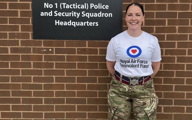 Gillian Craig smiling in Fund tshirt and camo uniform trousers