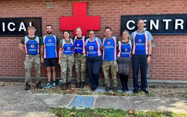 RAF Benson personnel in Fund vests standing outside medical centre
