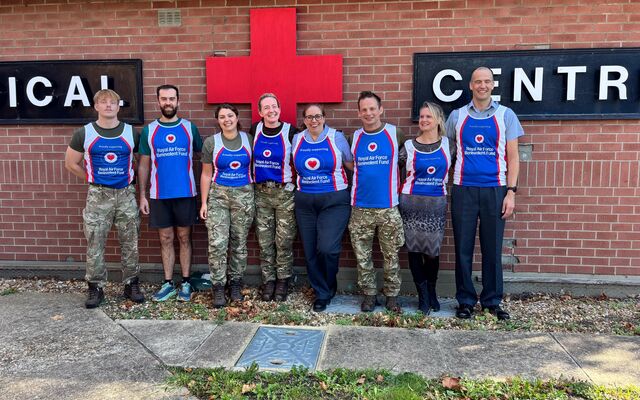 RAF Benson personnel in Fund vests standing outside medical centre
