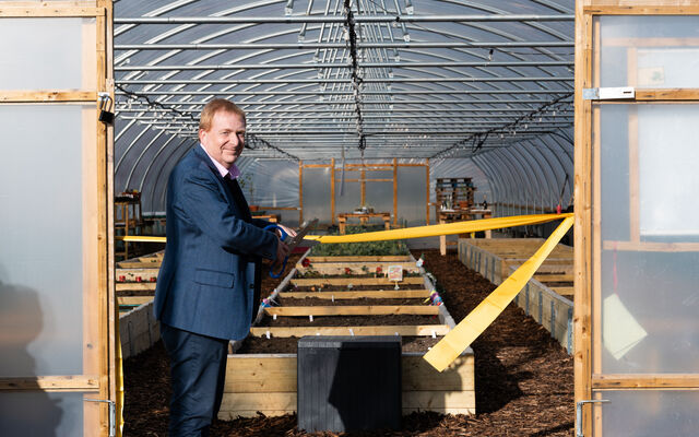 Simon cutting the ribbon at RAF Northolt polytunnels