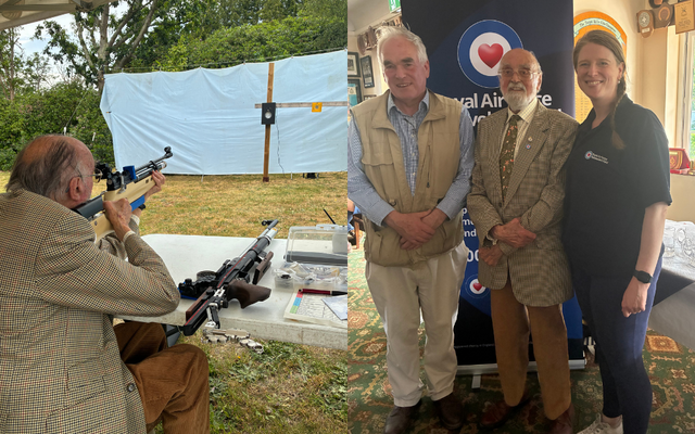 Man holding rifle aiming and 3 members standing smiling in front of Fund logo