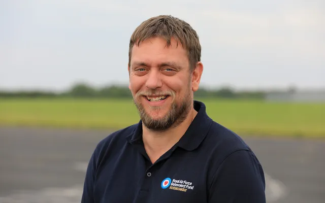 Matt in Fund polo on airfield