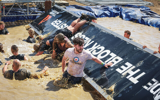 Brendan in the muddy water 