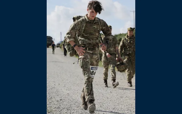 Lewis in camo walking