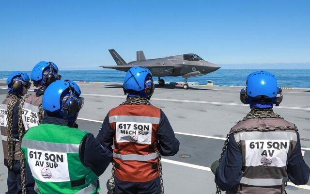 John in front of F-25