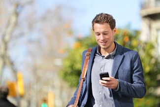 A man looking at his phone