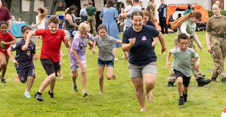 Henlow families day, children running and playing.