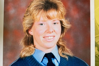 A headshot portrait of Christine Carr, a retired Senior Aircraftwoman based at RAF Henlow.