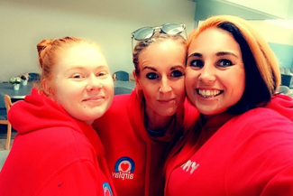 An image of Natalie Evans and two friends, wearing Airplay hoodies.