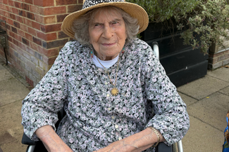 An image of WAAF veteran, Dorothy Border, sat in her wheelchair.