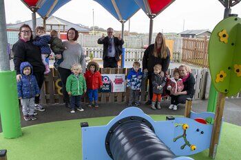 Parents and children at Ben's Play playground