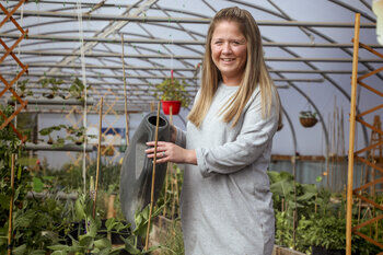 Amileigh Salt in her greenhouse