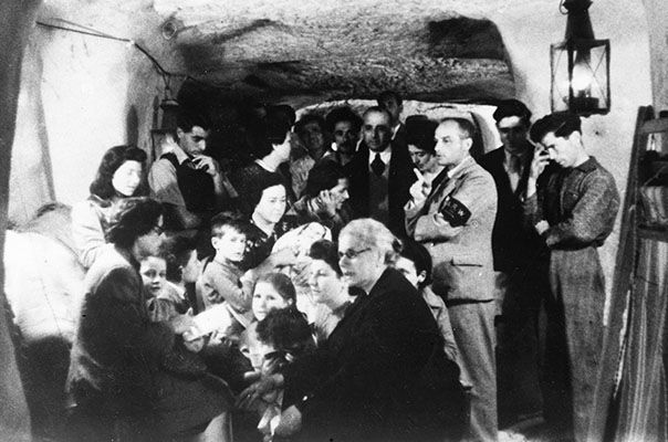 The view inside an air raid shelter during an attack on Valetta in May 1942. (UK Crown Copyright / MOD. Courtesy of Air Historical Branch, RAF)