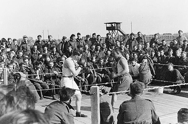 PoWs watch a boxing match at Stalag Luft III prison camp.