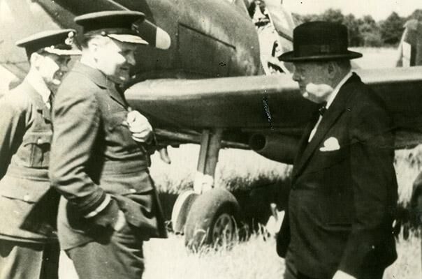 Air Vice Marshal Sholto Douglas greets Prime Minster Winston Churchill.