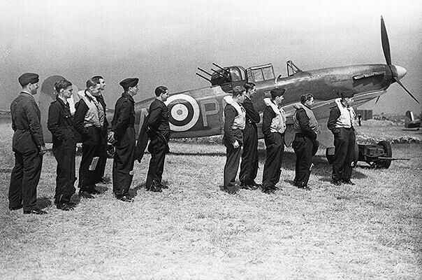 Aircrew next to a Bolton Paul Defiant.