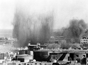 Bombs bursting on Valletta during an enemy air raid in May 1942. (UK Crown Copyright / MOD. Courtesy of Air Historical Branch, RAF)