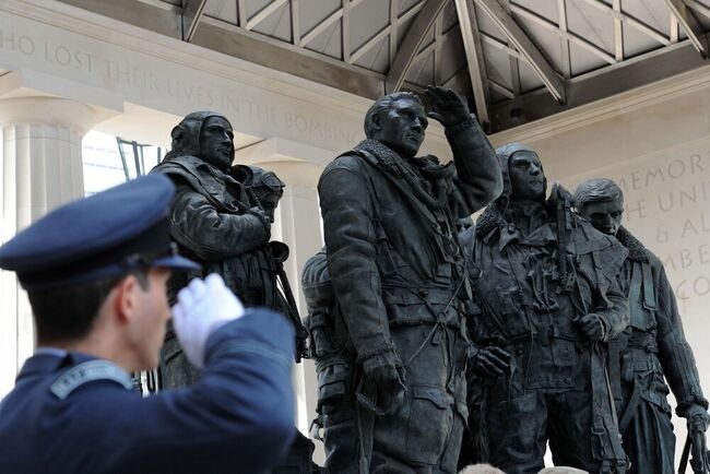 Serviceman salutes Bomber Command Memorial