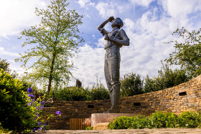 The sculpture of the RAF pilot looking up at the sky 