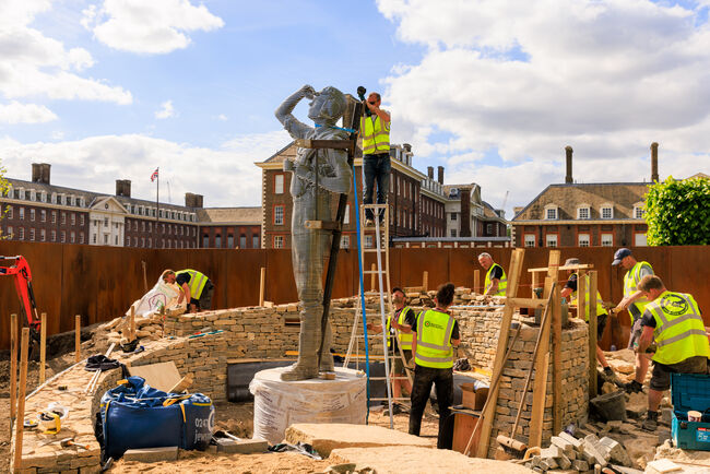 The team installing the 12ft tall sculpture