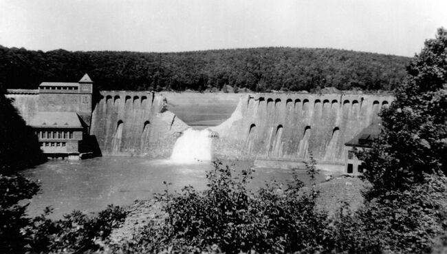 German photograph of the breach wall of the Eder dam after the "Dambusters" raid in May 1943. Crown Copyright, MOD.