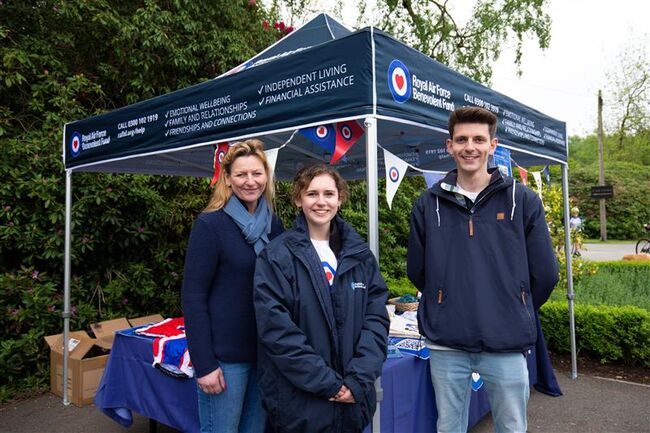 Josh Rowles at tent selling medals