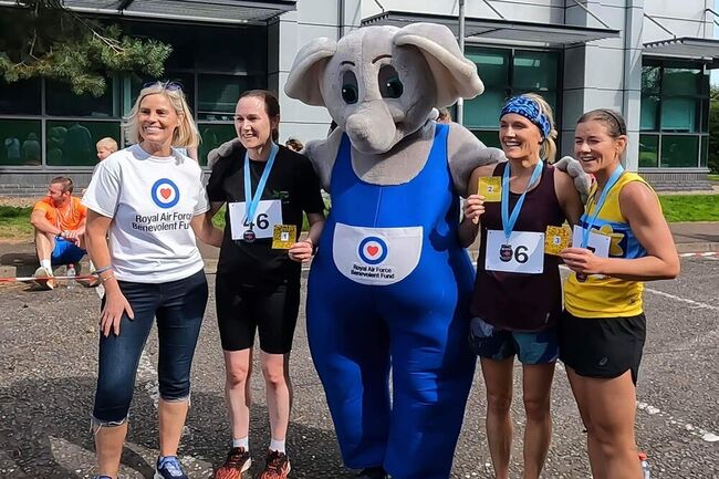 Julie Corbett and others with Ben Elephant mascot