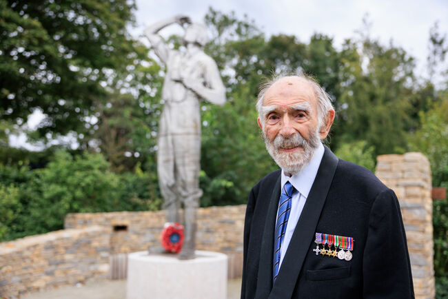 Albert Howard in front of Strongest Link Garden