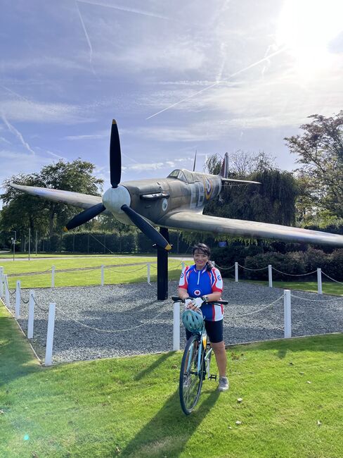 Trish at HQ Air Cmd High Wycombe in front of Spitfire