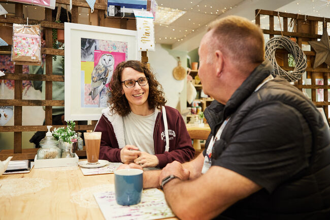 Danni smiling with mentor Geoff