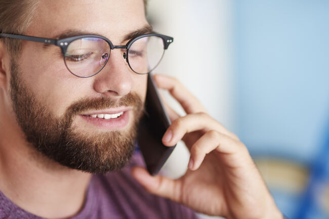 Man holding phone to ear