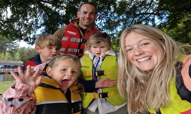 Family photo wearing life jackets on an activity day out