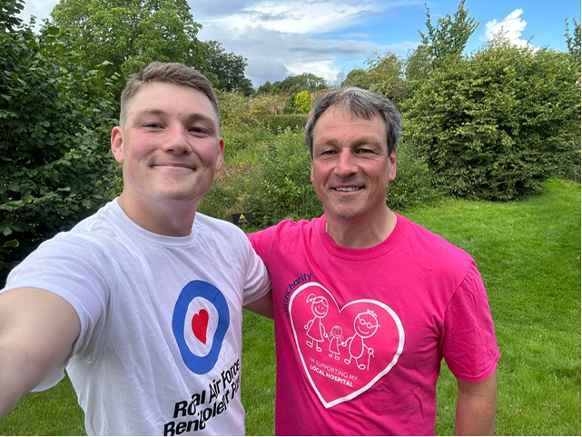 Tom wearing Fund tshirt with arm around dad Nigel