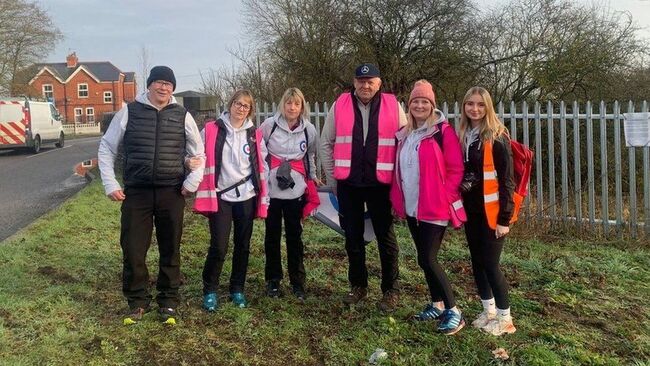 Carrianne's family and friends gathered in hi-vis