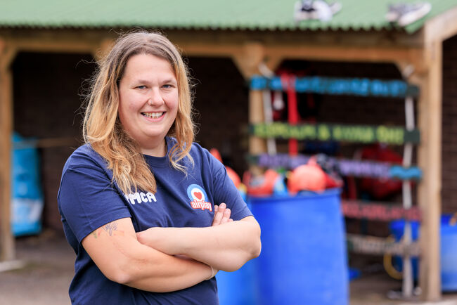 Julia Purton smiling arms crossed