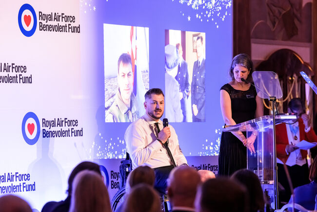 Fund ambassador guest speaking on stage.