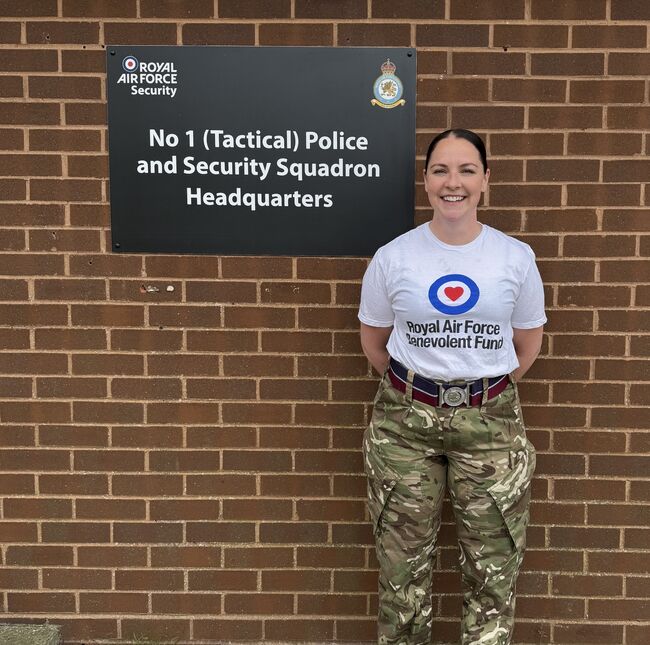 Gillian Craig smiling in Fund tshirt and camo uniform trousers