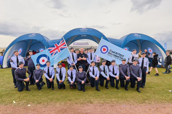 Cadets in front of Fund stand