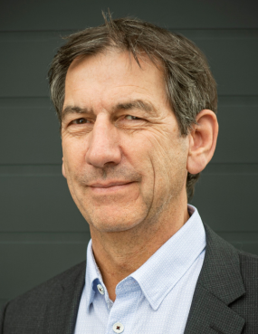 A headshot portrait of John Neilson